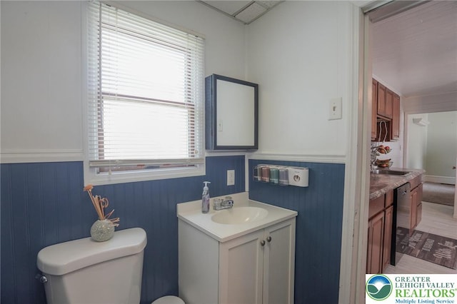 126 W High St, Coaldale Boro, PA 18218 - bathroom featuring vanity and wainscoting