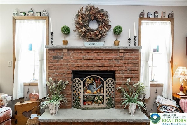 2300 Woodridge Ter, Easton, PA 18045 - living area with a fireplace and ornamental molding