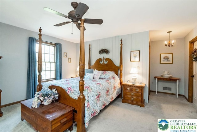 2300 Woodridge Ter, Easton, PA 18045 - bedroom featuring light carpet, a chandelier, and ceiling fan
