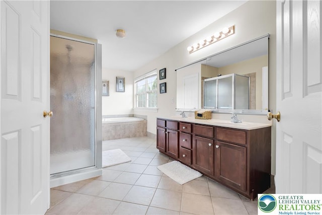 4325 Crosswinds Dr, Easton, PA 18045 - bathroom featuring a shower stall, double vanity, a bath, and tile patterned flooring