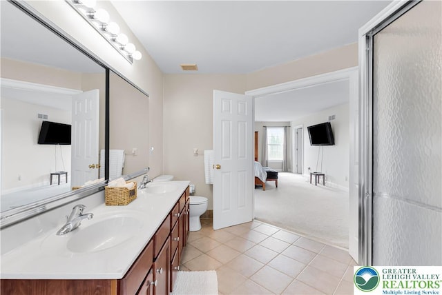 4325 Crosswinds Dr, Easton, PA 18045 - bathroom featuring double vanity, tile patterned floors, and ensuite bath