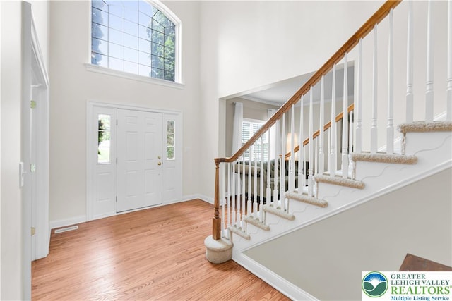 4325 Crosswinds Dr, Easton, PA 18045 - foyer with a towering ceiling, wood finished floors, stairs, and plenty of natural light