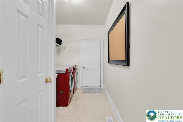 4325 Crosswinds Dr, Easton, PA 18045 - laundry room with separate washer and dryer and baseboards