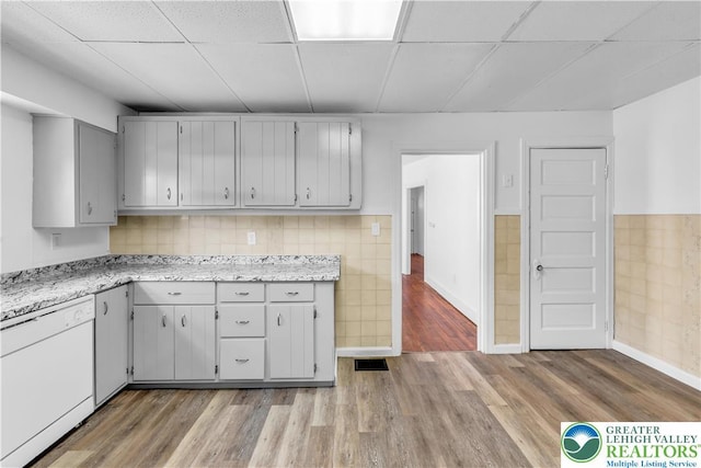 133 S 14th St, Easton, PA 18042 - kitchen featuring dishwasher, a drop ceiling, and light wood-style floors