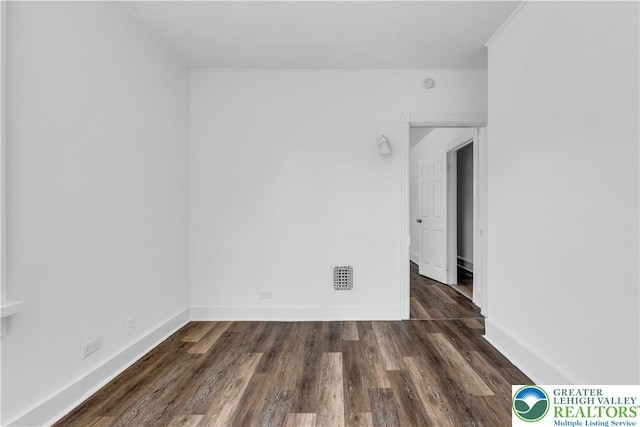 133 S 14th St, Easton, PA 18042 - unfurnished room featuring dark wood finished floors and crown molding