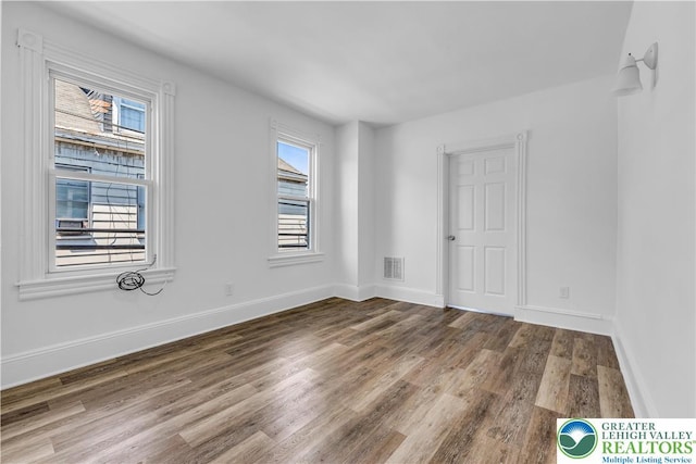 133 S 14th St, Easton, PA 18042 - spare room featuring wood finished floors and baseboards