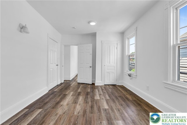 133 S 14th St, Easton, PA 18042 - unfurnished bedroom with dark wood finished floors and a closet