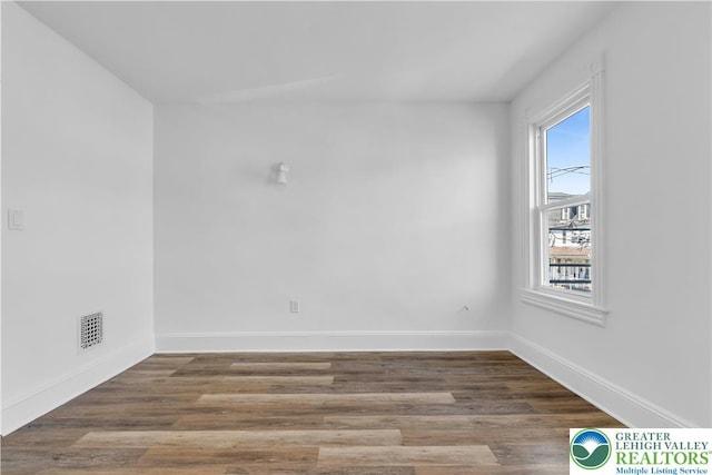 133 S 14th St, Easton, PA 18042 - empty room with wood finished floors
