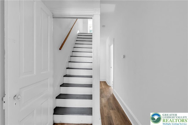 133 S 14th St, Easton, PA 18042 - staircase with wood finished floors and baseboards