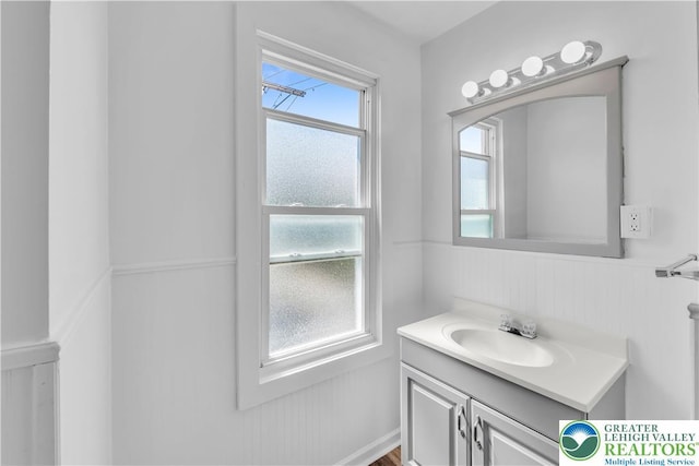 133 S 14th St, Easton, PA 18042 - bathroom featuring vanity and a wainscoted wall