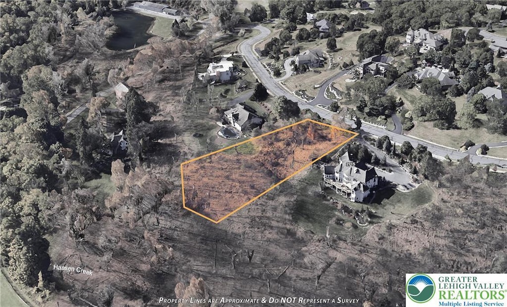 2695 Apple Valley Estates Dr, South Whitehall Twp, PA 18069 - aerial view of property and surrounding area with property boundaries highlighted