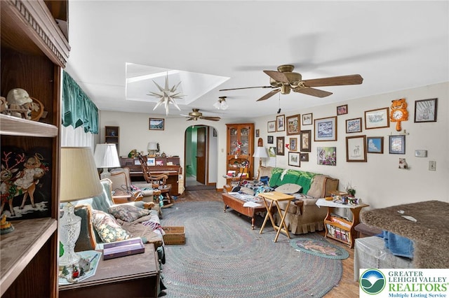 4157 Butternut Dr, Lehigh Twp, PA 18088 - living room with a ceiling fan, arched walkways, and wood finished floors