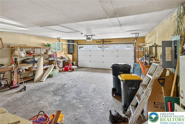 4157 Butternut Dr, Lehigh Twp, PA 18088 - garage with a garage door opener, electric panel, and a workshop area