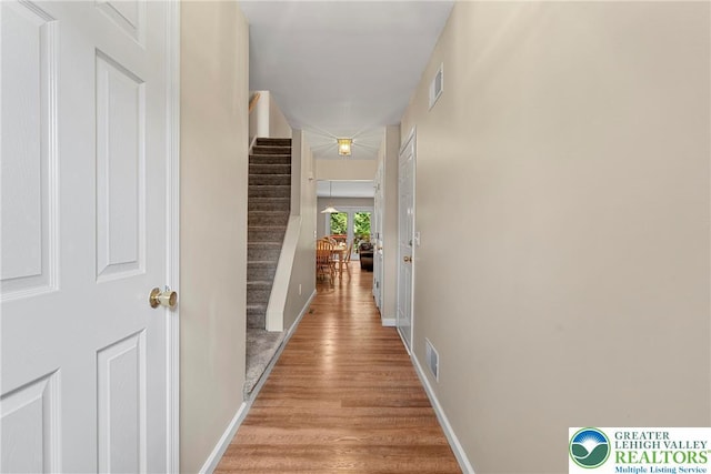 4220 Cheyenne Ct, North Whitehall Twp, PA 18078 - hallway featuring light wood finished floors and stairs