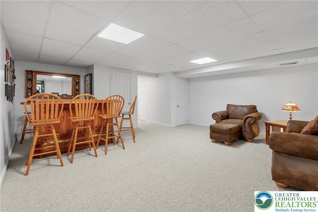 4220 Cheyenne Ct, North Whitehall Twp, PA 18078 - dining space featuring a dry bar, carpet floors, and a paneled ceiling