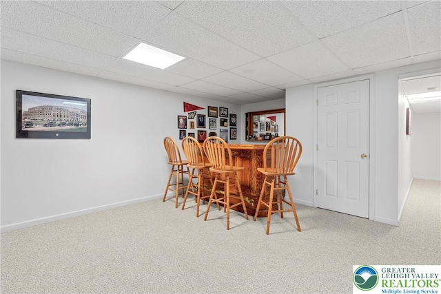 4220 Cheyenne Ct, North Whitehall Twp, PA 18078 - dining space with a dry bar, carpet, and a drop ceiling