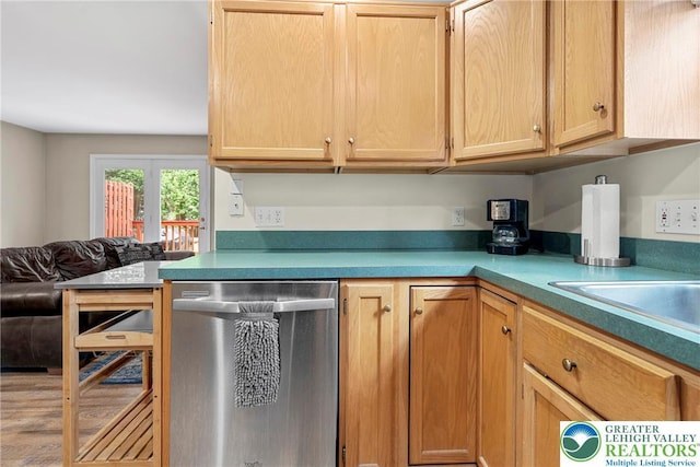 4220 Cheyenne Ct, North Whitehall Twp, PA 18078 - kitchen with stainless steel dishwasher, light brown cabinets, light countertops, and open floor plan