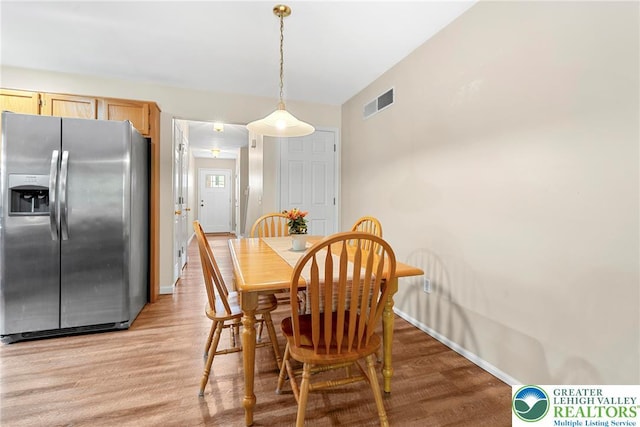 4220 Cheyenne Ct, North Whitehall Twp, PA 18078 - dining area featuring light wood finished floors and baseboards
