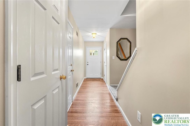 4220 Cheyenne Ct, North Whitehall Twp, PA 18078 - doorway with baseboards and wood finished floors