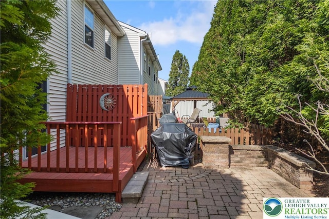 4220 Cheyenne Ct, North Whitehall Twp, PA 18078 - wooden terrace featuring a gazebo, area for grilling, and a patio area