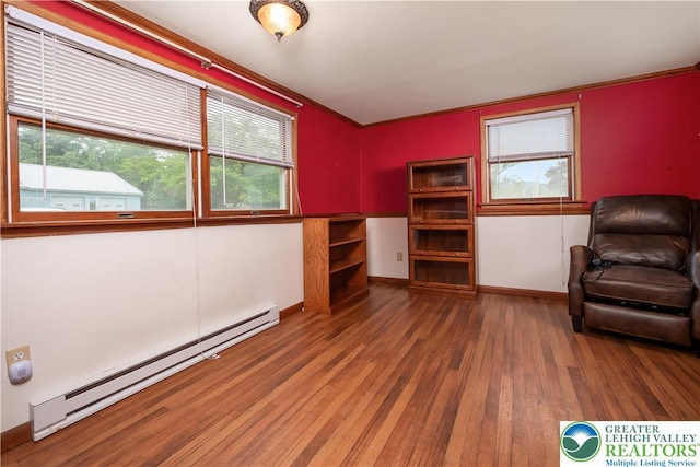 1155 Lake Minsi Dr, Upper Mt Bethel Twp, PA 18013 - living area featuring a baseboard heating unit, hardwood / wood-style flooring, and crown molding