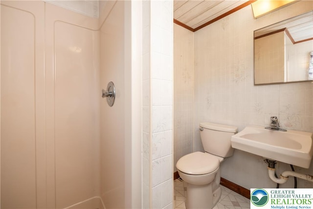 1155 Lake Minsi Dr, Upper Mt Bethel Twp, PA 18013 - bathroom with crown molding, tile walls, and a shower