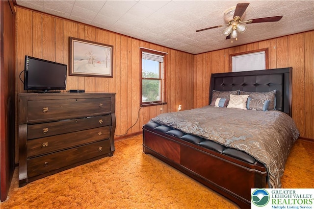 1155 Lake Minsi Dr, Upper Mt Bethel Twp, PA 18013 - carpeted bedroom featuring wood walls and ceiling fan