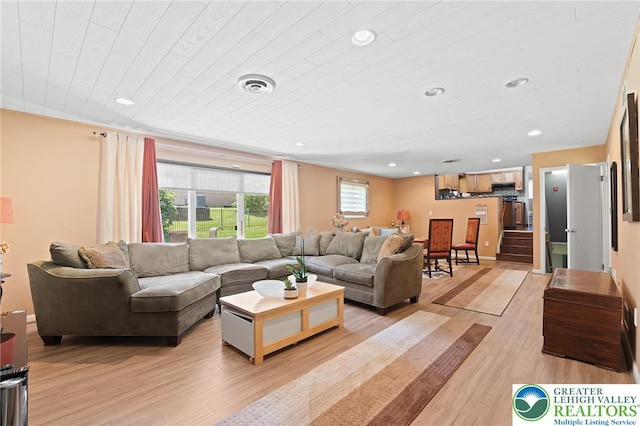 1048 N 27th St, Allentown City, PA 18104 - living room with light wood-type flooring, recessed lighting, and stairs