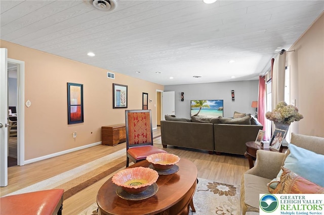 1048 N 27th St, Allentown City, PA 18104 - living area featuring light wood-type flooring, wooden ceiling, and recessed lighting