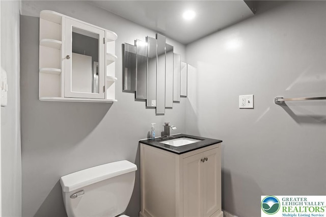 1048 N 27th St, Allentown City, PA 18104 - half bathroom featuring toilet and vanity