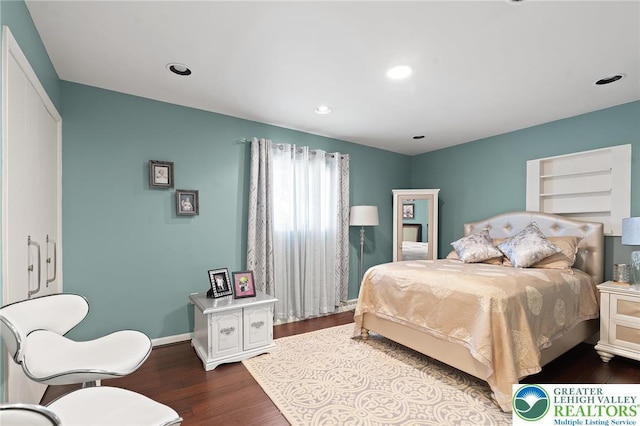 1048 N 27th St, Allentown City, PA 18104 - bedroom with dark wood-type flooring and recessed lighting