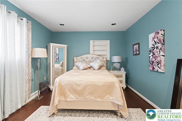 1048 N 27th St, Allentown City, PA 18104 - bedroom featuring dark wood-style floors
