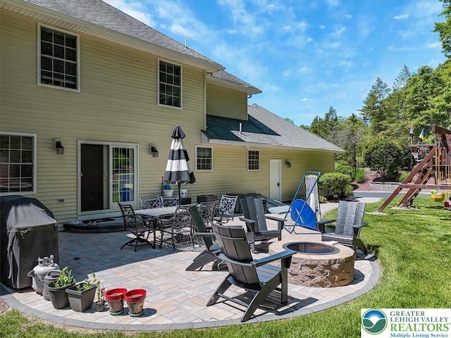1376 Buck Ridge Dr, Hamilton Twp, PA 18360 - view of patio / terrace featuring a fire pit and a playground