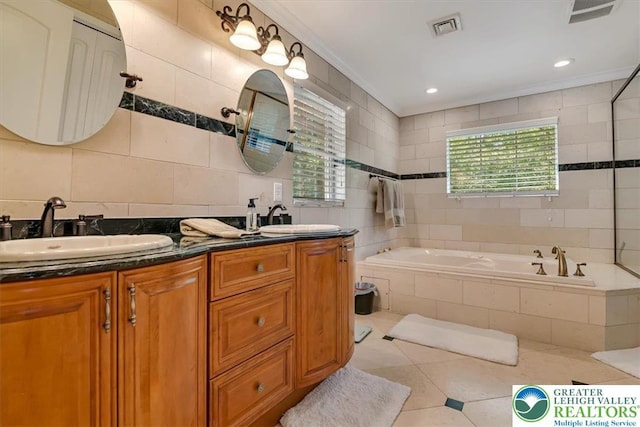 1376 Buck Ridge Dr, Hamilton Twp, PA 18360 - bathroom featuring tile walls, a bath, double vanity, tile patterned floors, and crown molding