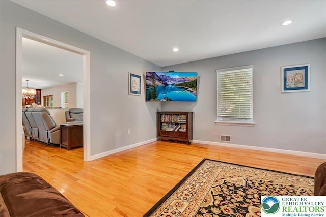 1376 Buck Ridge Dr, Hamilton Twp, PA 18360 - hall featuring light wood finished floors, a chandelier, and recessed lighting