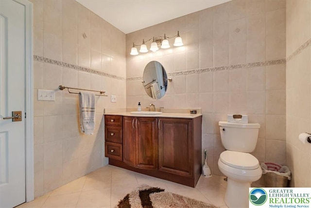 1376 Buck Ridge Dr, Hamilton Twp, PA 18360 - bathroom with tile walls, tile patterned flooring, and vanity