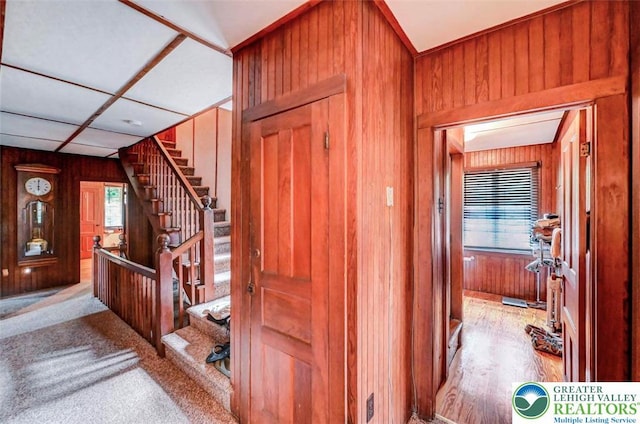 664 Griscom Rd, Barrett Twp, PA 18323 - foyer entrance featuring wooden walls and stairs
