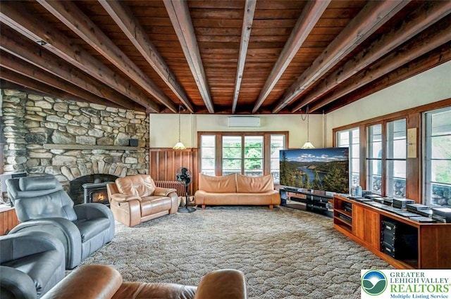 664 Griscom Rd, Barrett Twp, PA 18323 - living area with a wall mounted air conditioner and a wooden ceiling with exposed beams