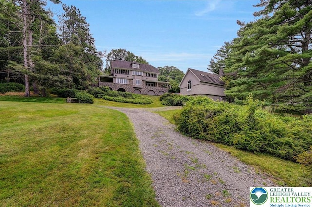 664 Griscom Rd, Barrett Twp, PA 18323 - view of community featuring a yard and driveway