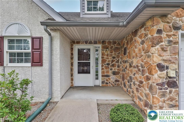 2638 Harvest Dr S, Forks Twp, PA 18040 - doorway to property with stone siding and stucco siding