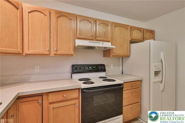2638 Harvest Dr S, Forks Twp, PA 18040 - kitchen with electric range oven, under cabinet range hood, white fridge with ice dispenser, and light countertops