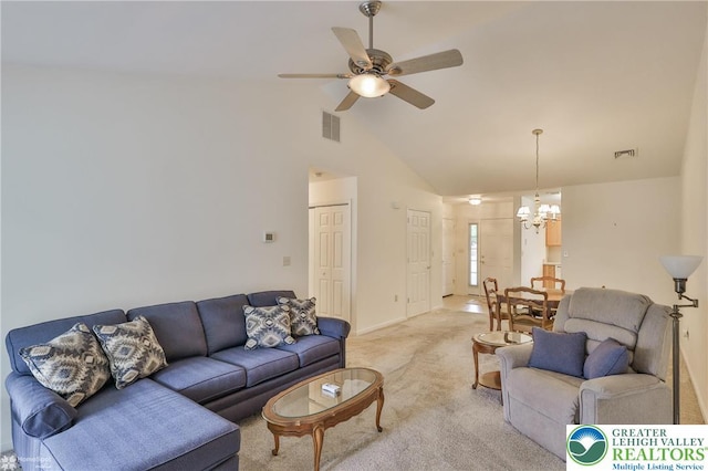 2638 Harvest Dr S, Forks Twp, PA 18040 - living room with a chandelier, light carpet, a ceiling fan, and high vaulted ceiling