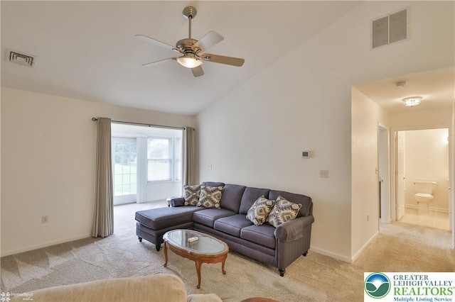 2638 Harvest Dr S, Forks Twp, PA 18040 - living room featuring light carpet, ceiling fan, and high vaulted ceiling
