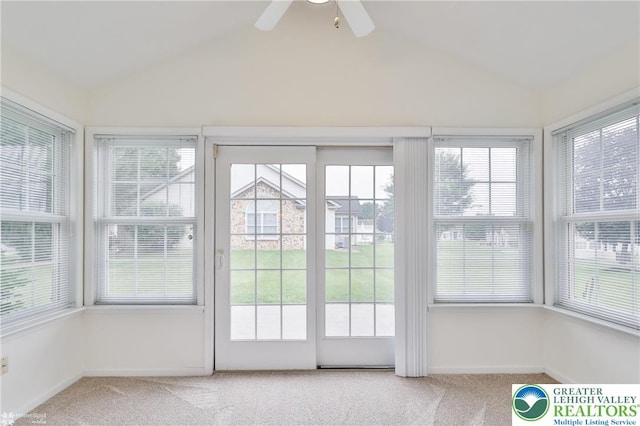 2638 Harvest Dr S, Forks Twp, PA 18040 - unfurnished sunroom with vaulted ceiling, carpet flooring, and plenty of natural light