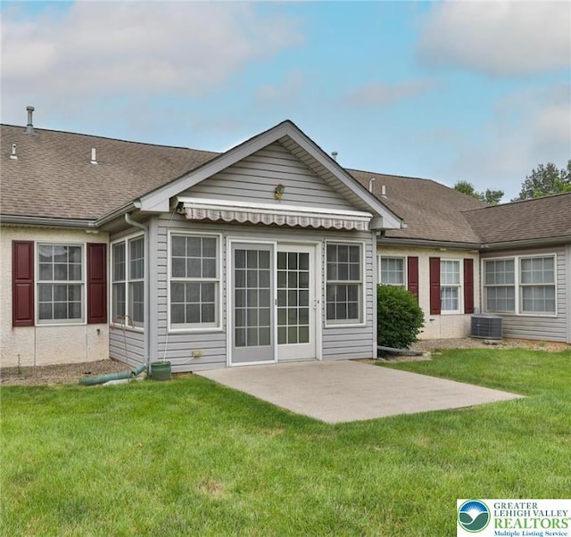2638 Harvest Dr S, Forks Twp, PA 18040 - rear view of property featuring a patio, a yard, and roof with shingles
