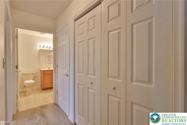2638 Harvest Dr S, Forks Twp, PA 18040 - hall with light carpet and a sink