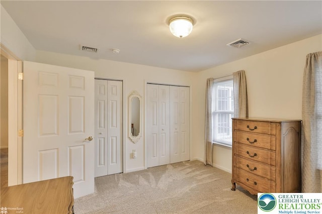 2638 Harvest Dr S, Forks Twp, PA 18040 - bedroom with multiple closets and light colored carpet