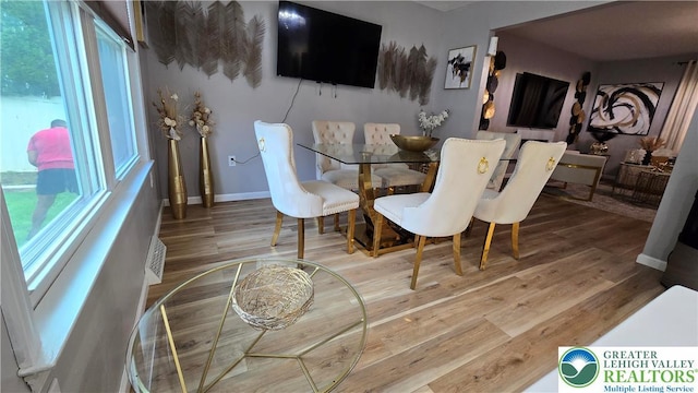 1136 Ashbourne Dr, Muhlenberg Twp, PA 19605 - dining room with wood finished floors and baseboards