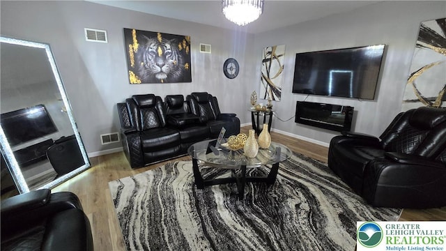 1136 Ashbourne Dr, Muhlenberg Twp, PA 19605 - living room featuring wood finished floors