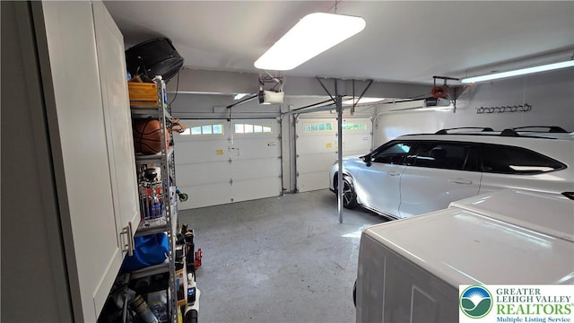 1136 Ashbourne Dr, Muhlenberg Twp, PA 19605 - garage featuring a garage door opener